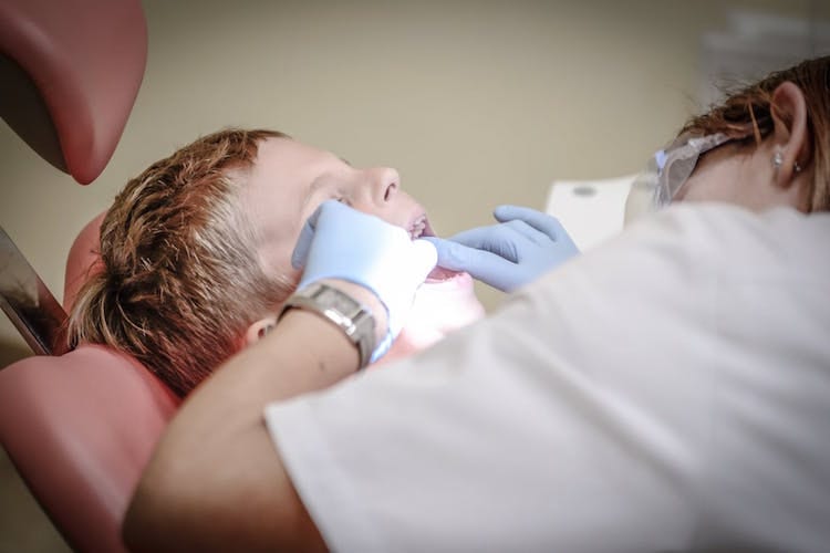 A young boy at the dentist's office 