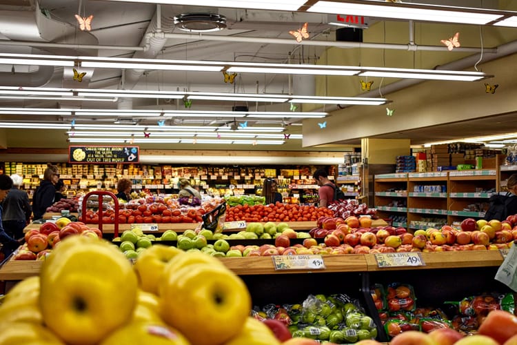 The interior of a grocery store, the fruit and vegetable section