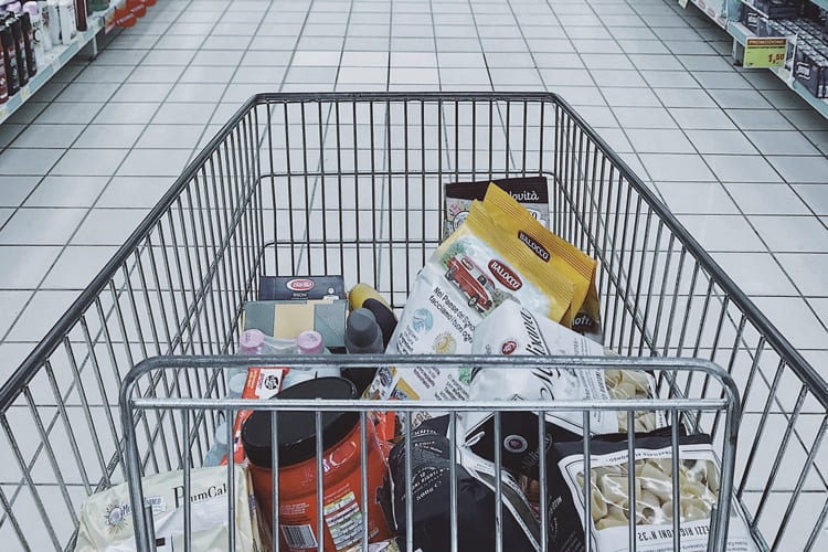 A grocery cart filled with food