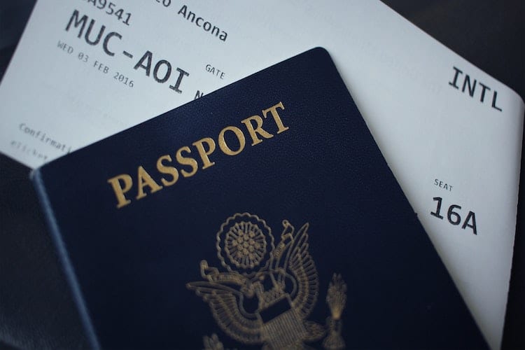 A U.S. passport with a boarding pass inside