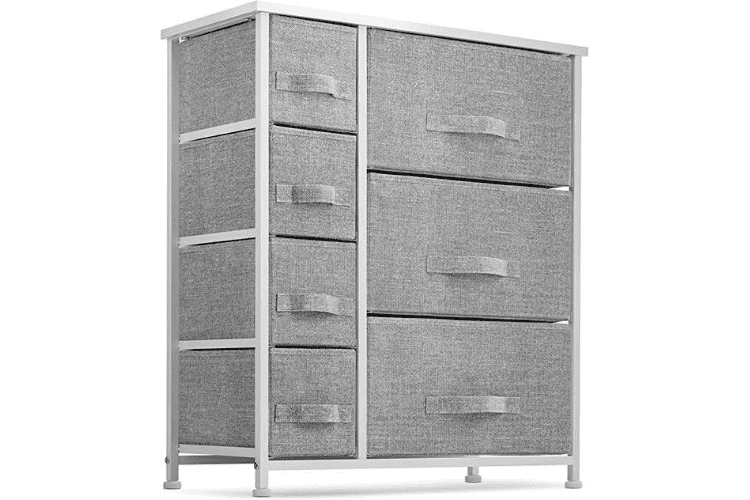 A gray dresser with seven drawers