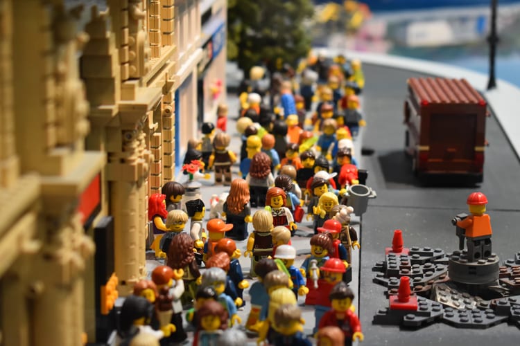 Close up of a LEGO city full of LEGO mini figures