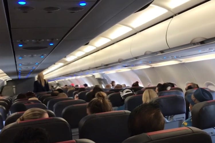 Packed flight during COVID-19 on American Airlines